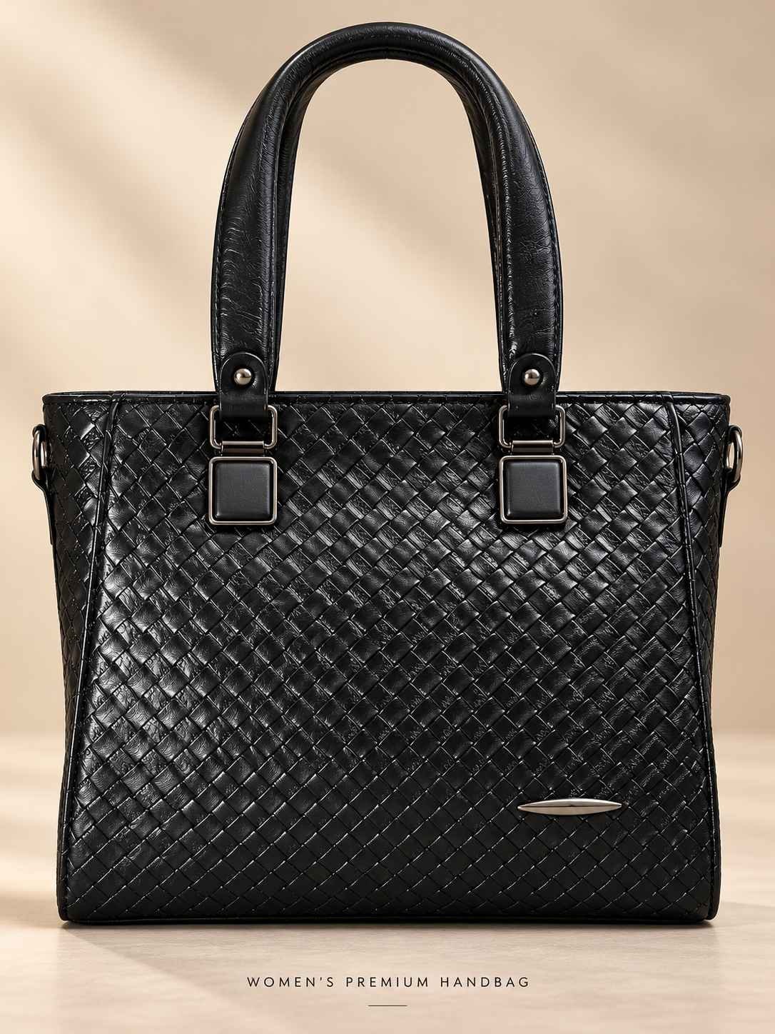 Women's black woven-texture handbag with glossy finish, two rounded top handles and square gunmetal fittings