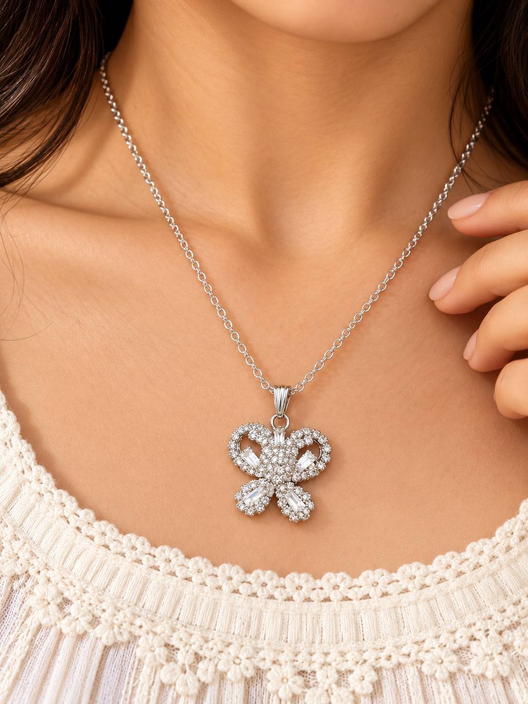 Butterfly pendant necklace with clear stones and a pair of round stud earrings, 2-piece combo set for women in silver-tone — image 4